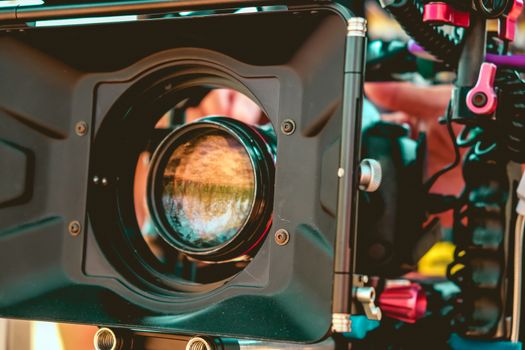 Film industry. Filming with professional camera background