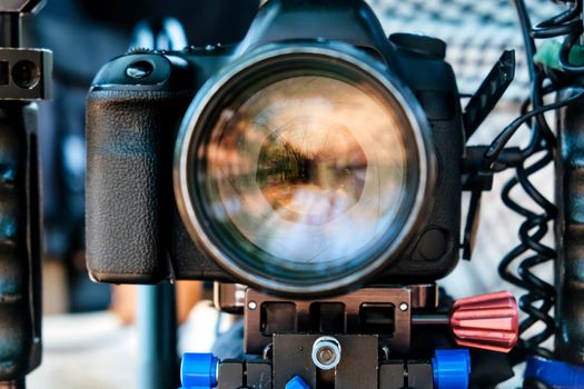 Film industry. Filming with professional camera background