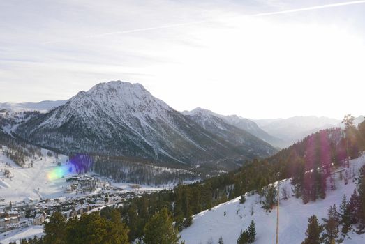 snowy landscape of Montgenvre in the high Alps in winter, france
