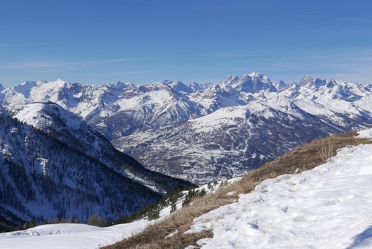 snowy landscape of Montgenvre in the high Alps in winter, france