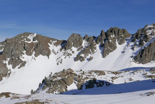 snowy landscape of Montgenvre in the high Alps in winter, france