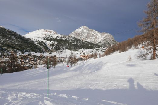 snowy landscape of Montgenvre in the high Alps in winter, france