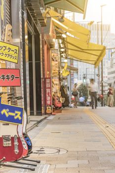 Ochanomizu district in Tokyo close to Meiji University whose main street known as Guitar Street, which is lined on both sides with guitar shops, violin shops or saxophone shops.