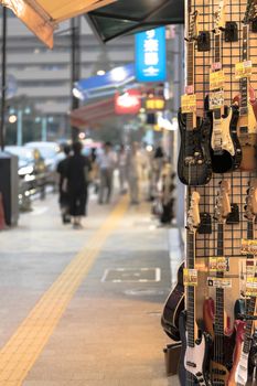 Ochanomizu district in Tokyo close to Meiji University whose main street known as Guitar Street, which is lined on both sides with used guitar shops, violin shops or saxophone shops.