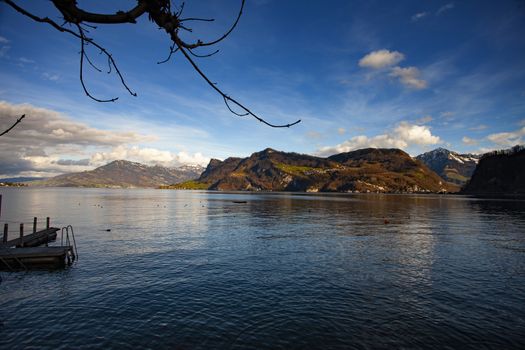 lake lucerne with Rig with clue sky and clouds with trees