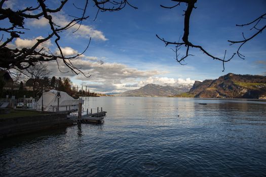 lake lucerne with Rig with clue sky and clouds with trees