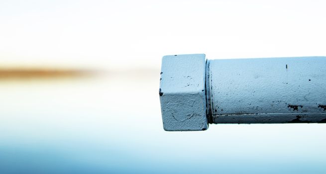 iron security railing painted white with copy space and out of focus background