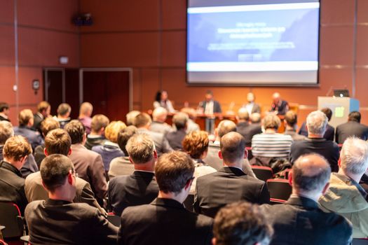 Round table discussion at business convention and Presentation. Audience at the conference hall. Business and entrepreneurship symposium.