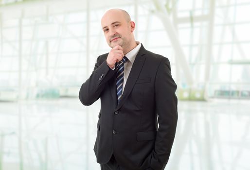 happy business man portrait at the office