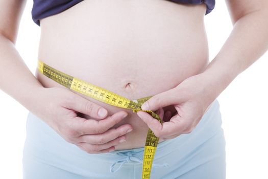 Closeup of pregnant woman at white background