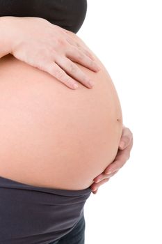 Closeup of pregnant woman at white background