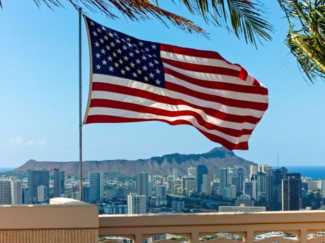 American flag flying over punchbowl crater memorial