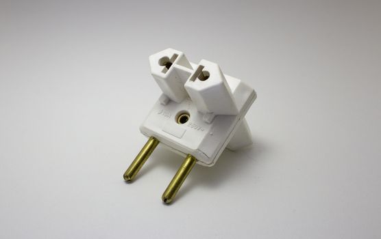 Travel power adapter made of plastic and metal for different electrical socket standards