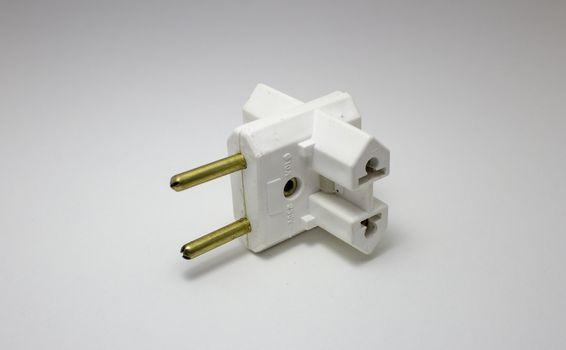 Travel power adapter made of plastic and metal for different electrical socket standards