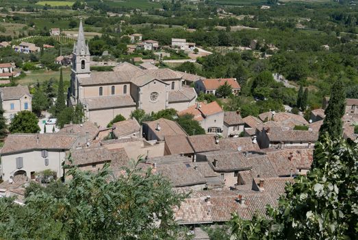 village of vaucluse, roussillon and bonnieux between vineyard and village, France