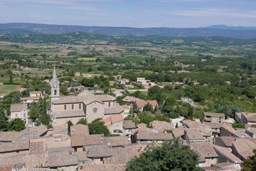 village of vaucluse, roussillon and bonnieux between vineyard and village, France
