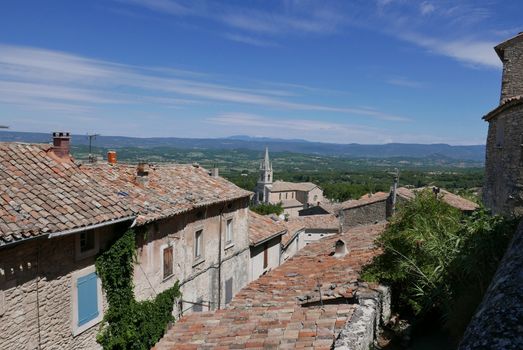 village of vaucluse, roussillon and bonnieux between vineyard and village, France