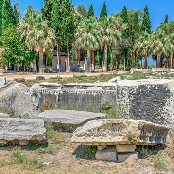 Huge stone blocks of the Ancient Theatre in the greek city of Miletus in Turkey on a sunny summer day