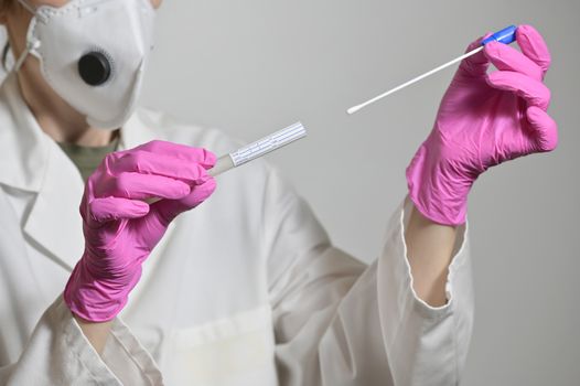 Nurse Holds A Swab For The Coronavirus / Covid19 Test