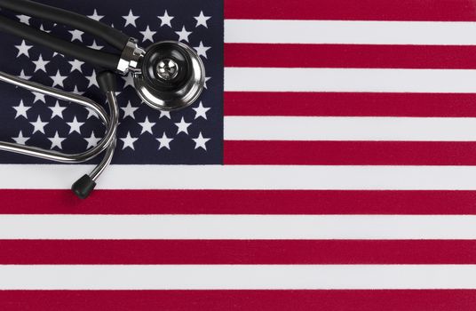 Medical stethoscope with United State flag as background with copy space  