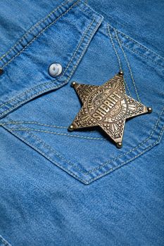 Star badge on a fabric background