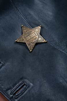 Star badge on a fabric background