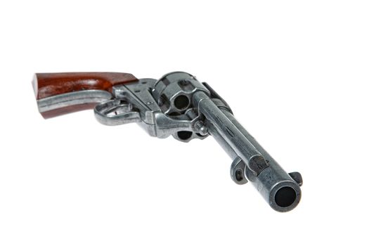 Old army single action revolver on an isolated studio background