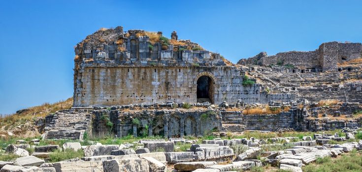 The ruins of an Ancient Theatre in the greek city of Miletus in Turkey on a sunny summer day