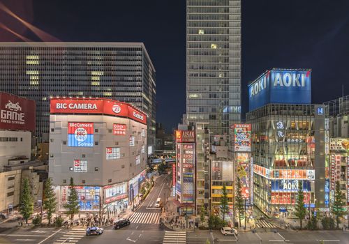 Aerial night view of the Akihabara Crossing Intersection in the electric town of Tokyo in Japan.