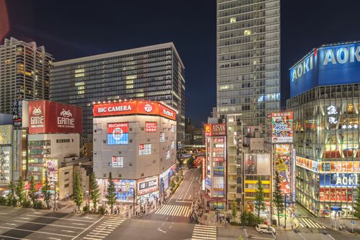 Aerial night view of the Akihabara Crossing Intersection in the electric town of Tokyo in Japan.