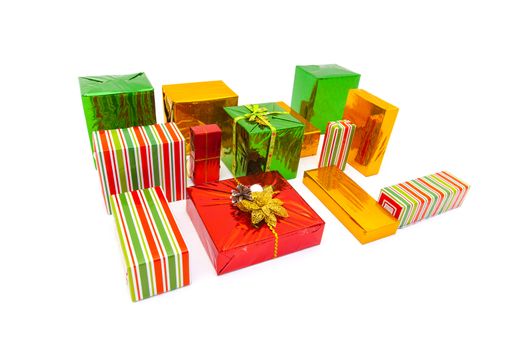 Boxes with xmas presents wrapped. Multi colored purchases. Isolated on white background