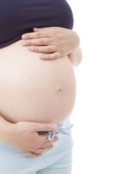 Closeup of pregnant woman at white background