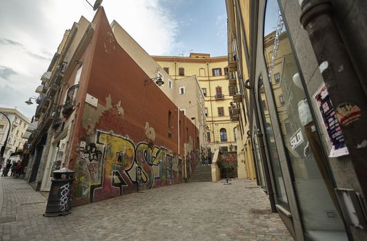 CAGLIARI, ITALY 10 MARCH 2020: Cagliari alleyway with Graffiti