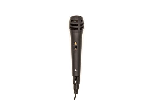 Karaoke microphone in black color on a white background