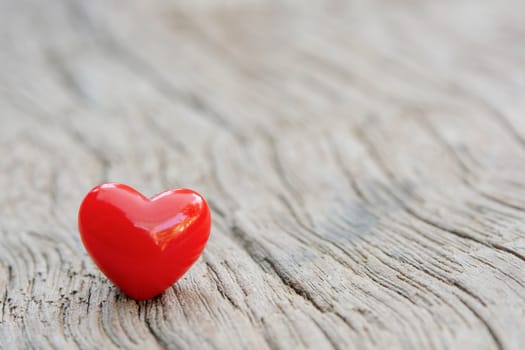 Valentines Day background with red hearts on plank wooden, copy space
