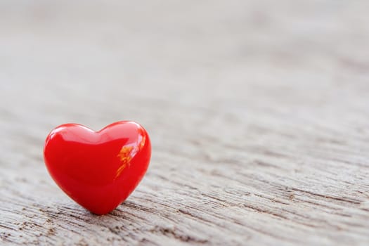 Valentines Day background with red hearts on plank wooden, copy space
