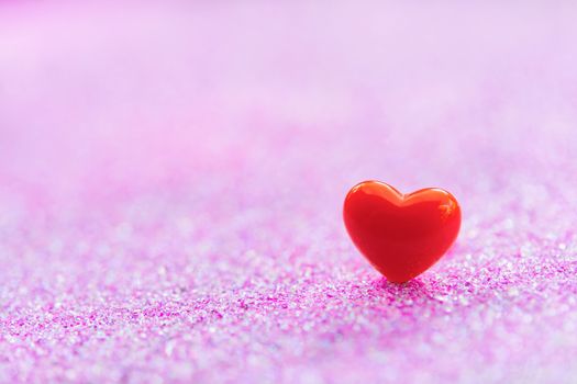 Valentines Day background with Red heart shapes on abstract light pink glitter background, Copy space