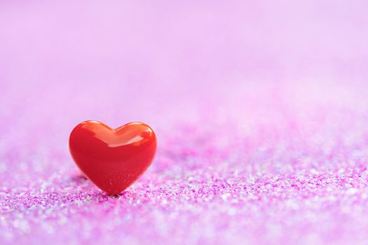 Valentines Day background with Red heart shapes on abstract light pink glitter background, Copy space