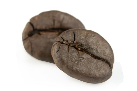Close up coffee beans isolated on white background with clipping path
