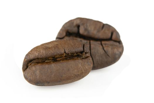 Close up coffee beans isolated on white background with clipping path

