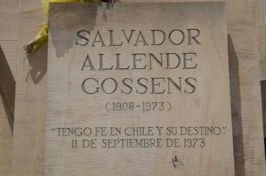 Plaque of the statue of Salvador Allende, former president of Chile. The Constitucion Square. Santiago de Chile. Chile.