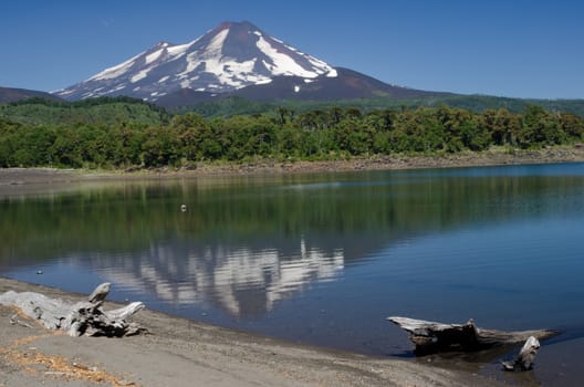 Llaima volcano reflected on the Conguillio lake. Conguillio National Park. Araucania Region. Chile.