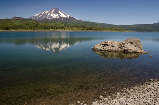 Llaima volcano reflected on the Conguillio lake. Conguillio National Park. Araucania Region. Chile.