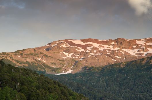 Mountain range and forest in the Conguillio National Park. Araucania Region. Chile.