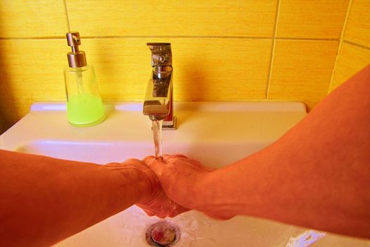 Man washing hands to prevent corona virus, hygiene to stop spreading coronavirus