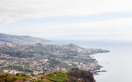 The view looking towards Funchal from Cabo Girao viewpoint on the Portuguese island of Madeira.
