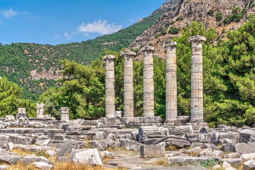 Ruins of the Temple of Athena Polias in the ancient city of Priene, Turkey, on a sunny summer day