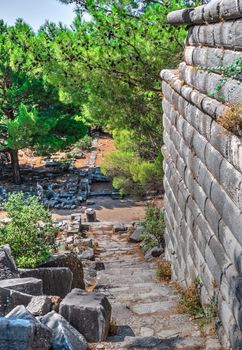 Ruins of the Ancient Theatre in the greek city of Priene in Turkey on a sunny summer day