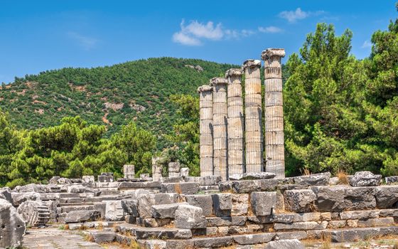 Ruins of the Temple of Athena Polias in the ancient city of Priene, Turkey, on a sunny summer day