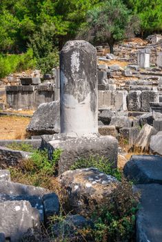 Ruins of the Ancient Theatre in the greek city of Priene in Turkey on a sunny summer day